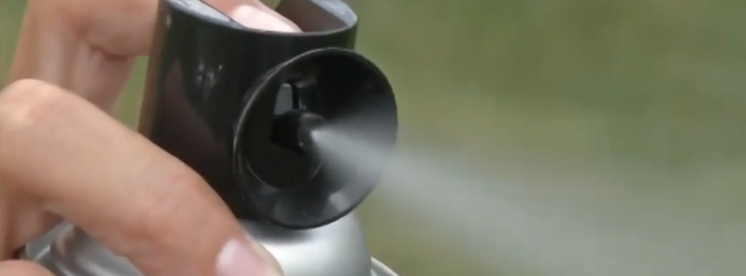 Person spraying wasp spray, the substance misused to make shock dope