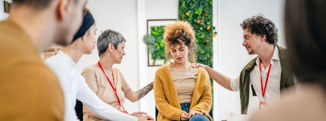 Image of Family members finding support through Nar-Anon and Al-Anon meetings