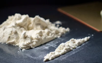 Cocaine powder and lines illustrating fentanyl risk and dangers of laced substances.
